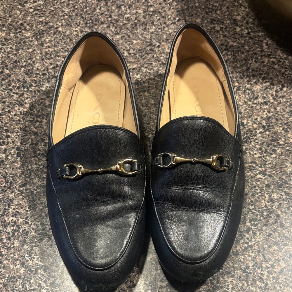 Coach Black Leather Slip-On Loafers with Gold Accents